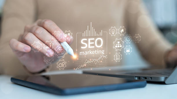 istock Businesswoman using stylus with SEO marketing interface, digital analytics and data strategy concept, modern business technology. 2230967295