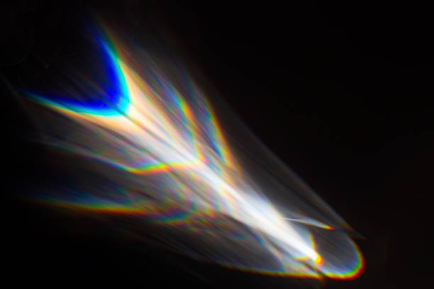 istock Water texture shadow with rainbow refraction of light on a black backgound. Overlay effect 2230967682