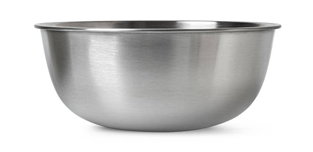 istock Shiny stainless steel mixing bowl on white surface 2230970203