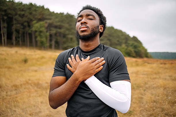 istock People enjoying in nature practicing healthy lifestyle taking a deep breath 2230971233