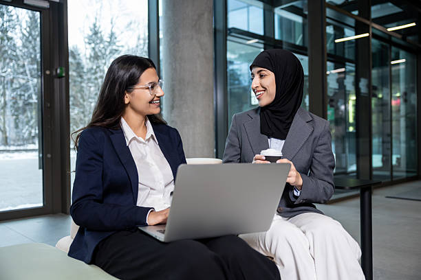 istock Two colleagues discussing project details and looking involved and interested 2230972613