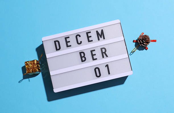 Lightbox calendar with text December 01 with Christmas, New Year winter decor on blue background