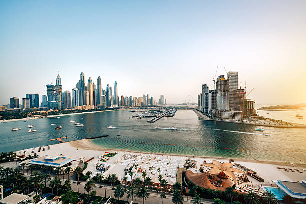 istock Modern Skyscrapers and Waterfront at Sunrise in Dubai Marina 2230979783