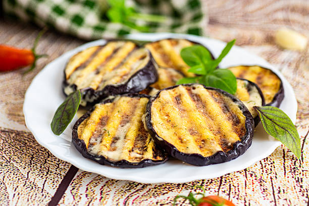 istock Baked eggplants with fried stripes and a delicate sauce 2230980859