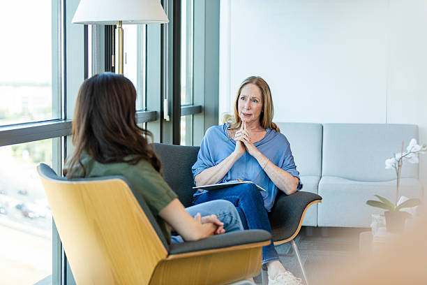 istock Counseling Session: Therapist Listening to Patient 2230981398