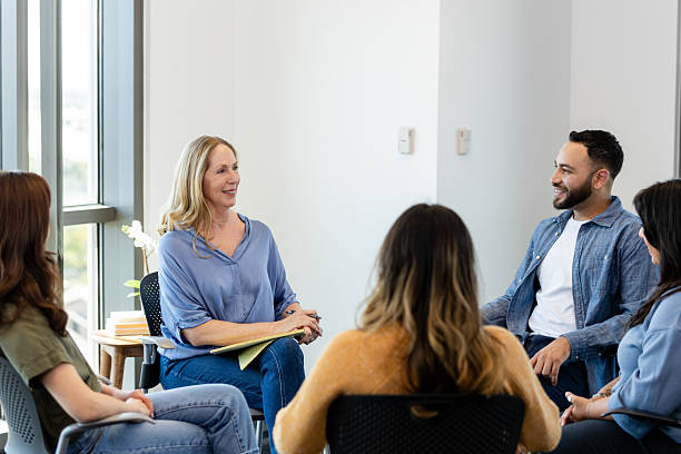 istock Group Therapy Session: Diverse Adults Discussing Mental Wellbeing 2230981453