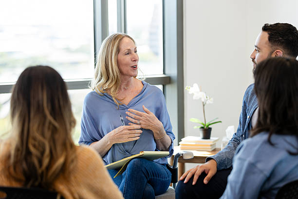 istock Group Therapy Session: Diverse People Discussing Mental Health 2230981460