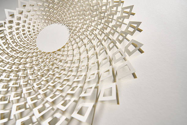 istock Intricate White Diamond-Shaped Spiral Mandala Cut from Layered Paper 2230983137