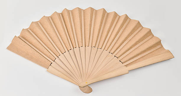istock Decorative hand fan crafted from natural materials 2230985937