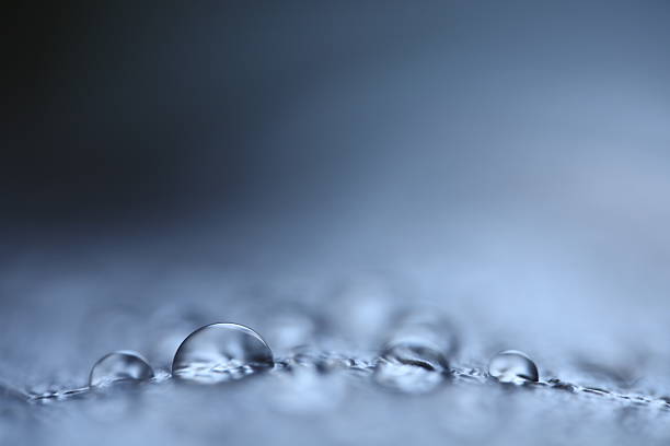 Blue liquid surface, soft bokeh