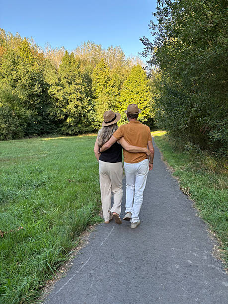 istock Close Senior Couple having a walk in the Park. 2230988725