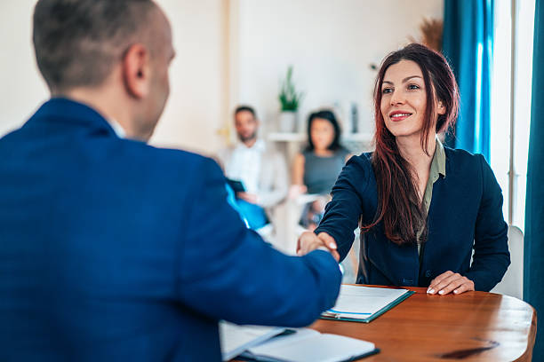 istock Successful business agreement sealed with a handshake in modern office 2230996518