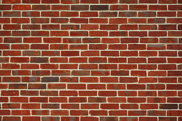 istock facade view of old red brick wall background 2230996529