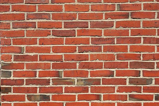istock facade view of old red brick wall background 2230998212