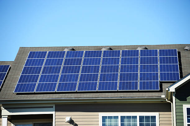 istock solar panel on the roof of apartment building 2230999247