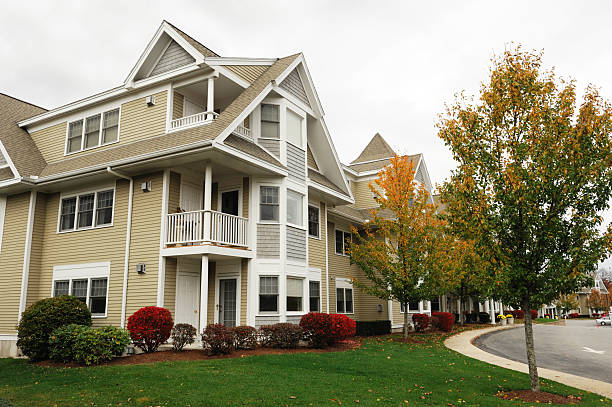 istock apartment building in autumn season 2231000177