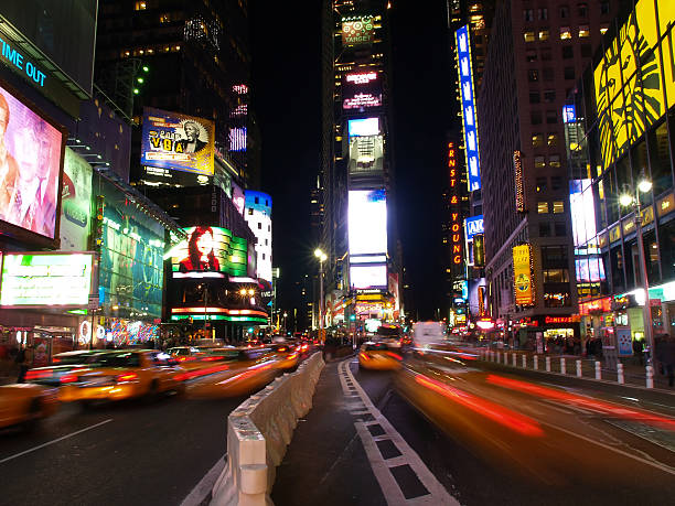 New York City, USA - 5th December 2006: Yellow Taxi Cabs in Times Square at Night