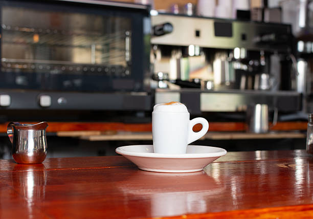 coffee mug with metal carafe and coffee machine