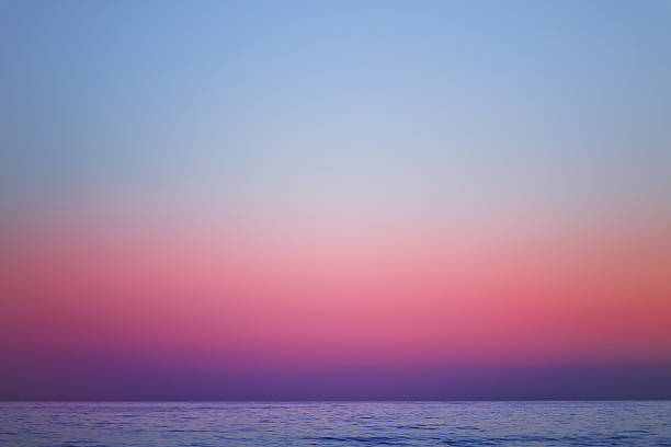 istock Beautiful landscape with sunset over the sea water surface. 2231005781