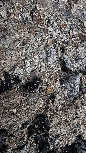 istock Close-up of ashes and charcoal after fire 2231008430