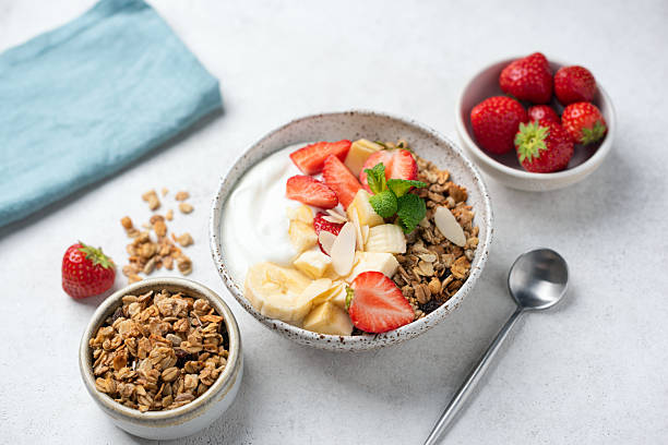istock Yogurt bowl with strawberry, banana and granola 2231009902