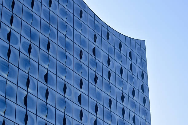 The Elbphilharmonie in Hamburg is a world-renowned concert hall and architectural landmark, opened in 2017. Built atop a historic warehouse in HafenCity, its striking glass facade and wave-like roof overlook the Elbe River. Inside, it houses state-of-the-art concert halls, a hotel, and a public plaza with panoramic city views.