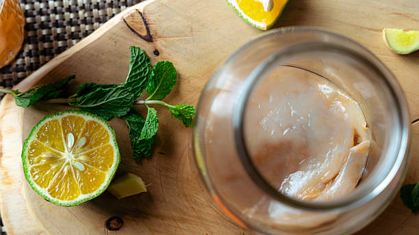 Making kombucha at home with calamansi, ginger, and mint, focusing on healthy fermentation and probiotics