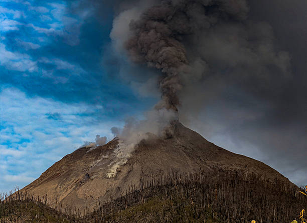 istock Volcano erupts and emits volcanic ash. 2231016953