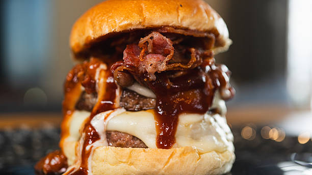 istock Juicy Gourmet Burger with Double Patty, Bacon, and Melted Cheese 2231018348
