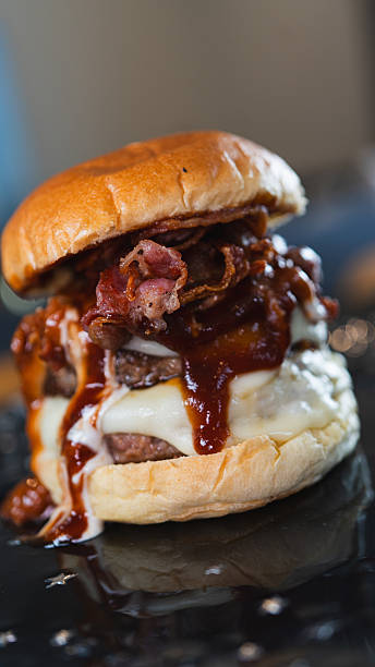 istock Juicy Gourmet Burger with Double Patty, Bacon, and Melted Cheese 2231018366