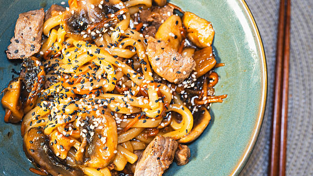 istock Udon Noodle Bowl with Beef and Vegetables 2231018473