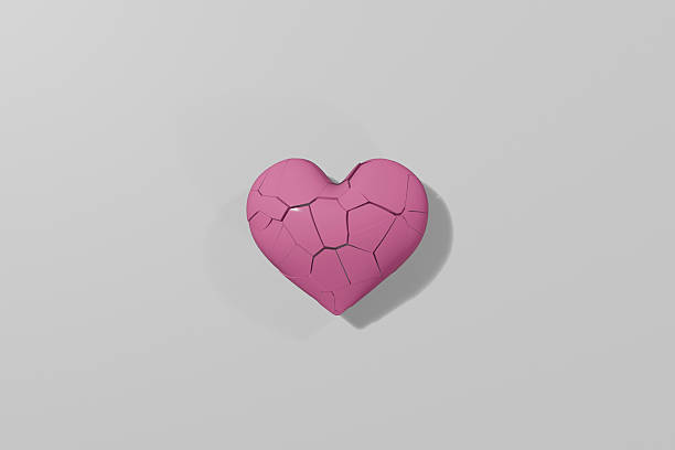 istock A pink heart mark that is beginning to break 2231021678