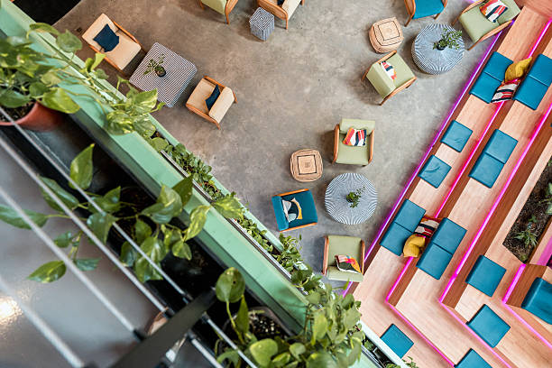 istock Aerial View Modern Office Lounge With Colorful Seating And Green Plant Elements 2231023638