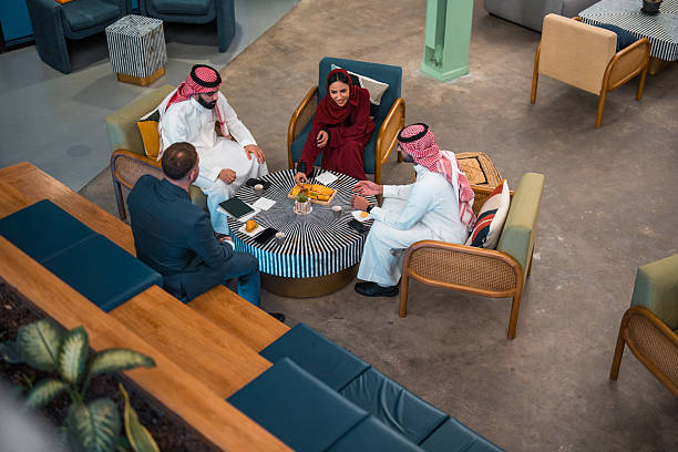 istock Middle Eastern Business Professionals in Collaborative Meeting with Young Caucasian Partner 2231023700