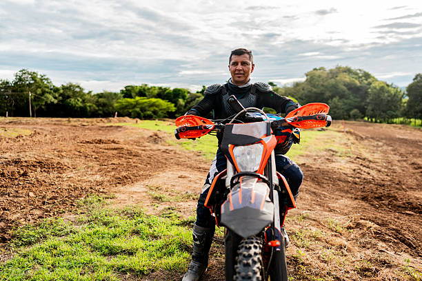 Motocross rider riding on a dirt track