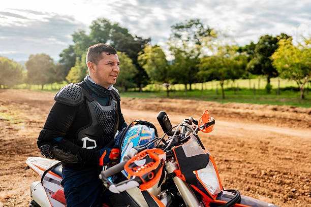 Motocross rider riding on a dirt track