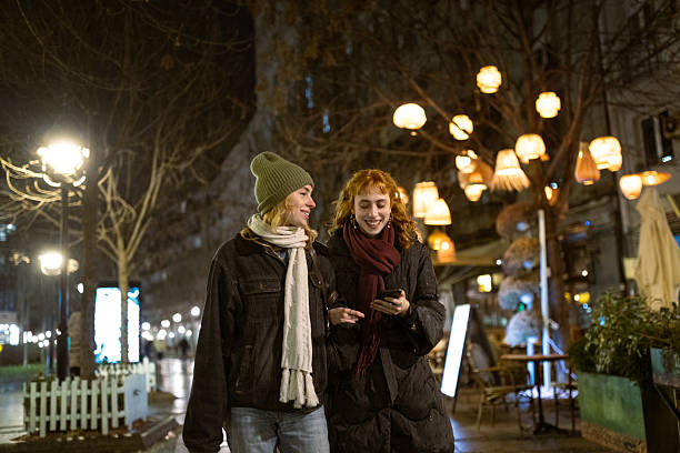 istock Christmas evening Stroll with Friends 2231028616