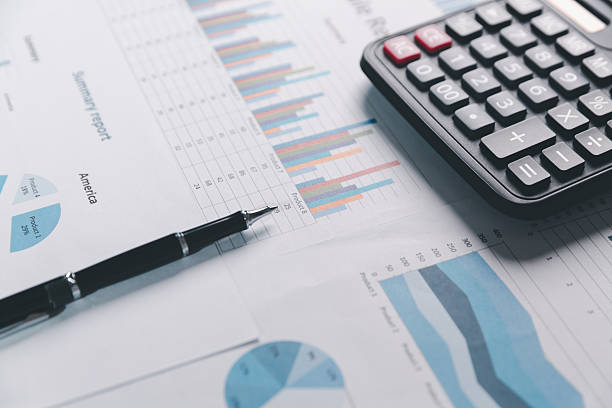 istock Auditor reviews financial statement and balance sheet on desk using a calculator, representing the concept of accounting, audit, and finance in preparing a detailed financial report for the business. 2231040051