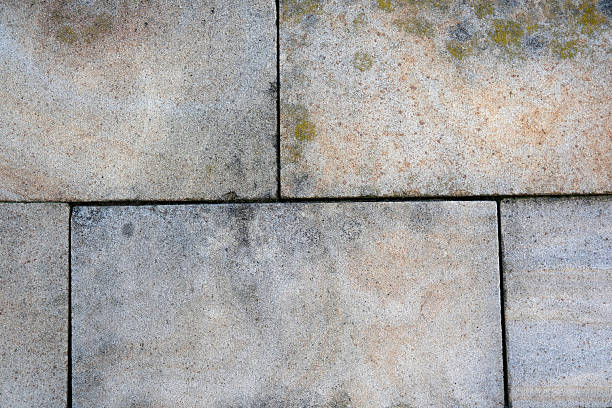 istock Textured concrete surface with colorful patterns and stains to explore 2231043574