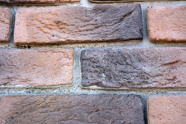 istock Elegant texture and patterns of rustic bricks in warm tones 2231043612