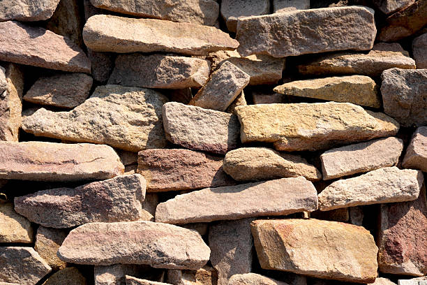 Textured stone wall creates a rustic and natural ambiance