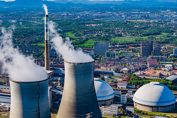 istock Thermal power plant under blue sky and white clouds 2231049370
