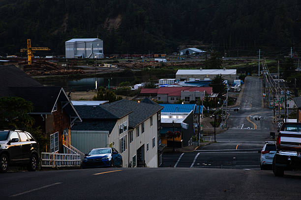 Small Town America quiet downtown businesses at dusk - Toledo Oregon, USA