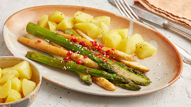 istock Baked asparagus with potatoes 2231062072