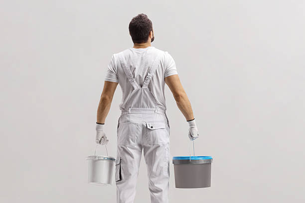 istock Rear view shot of a painter holding buckets 2231078553