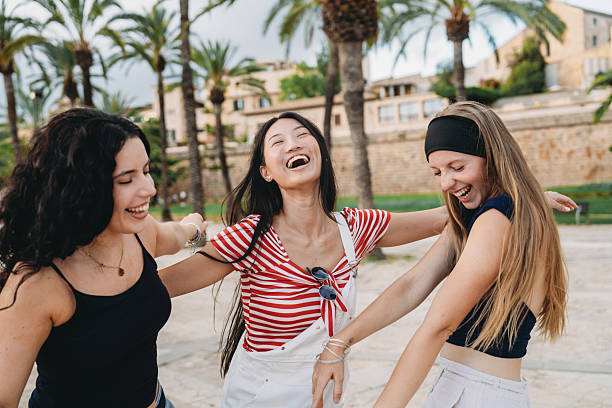 istock Three young women laughing together in Palma de Mallorca 2231078978