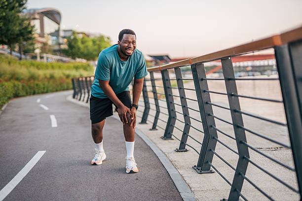 istock Runner experiencing knee pain after exercising outdoors 2231079378