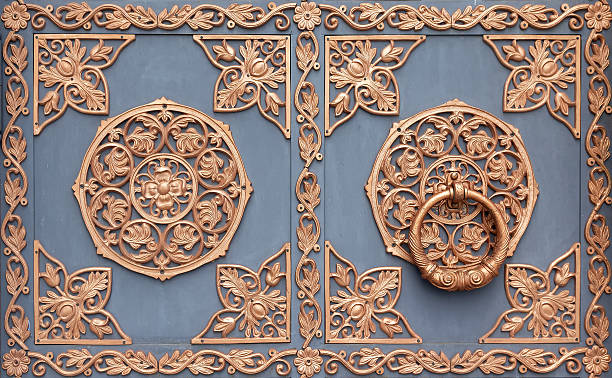 istock Forged floral patterns on metal gates 2231080111