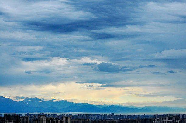 landscape with mountains and clouds in sunset