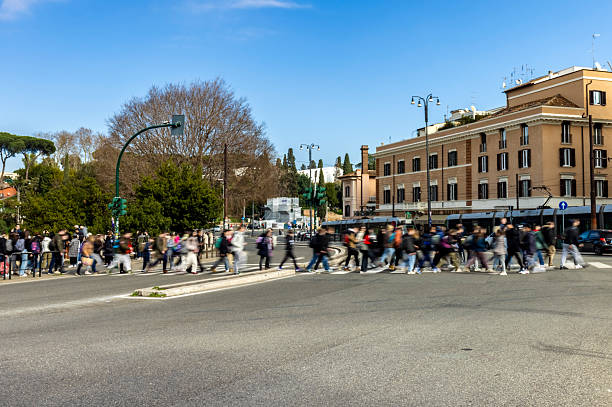 istock Street with pedestrians in Rome 2231084840